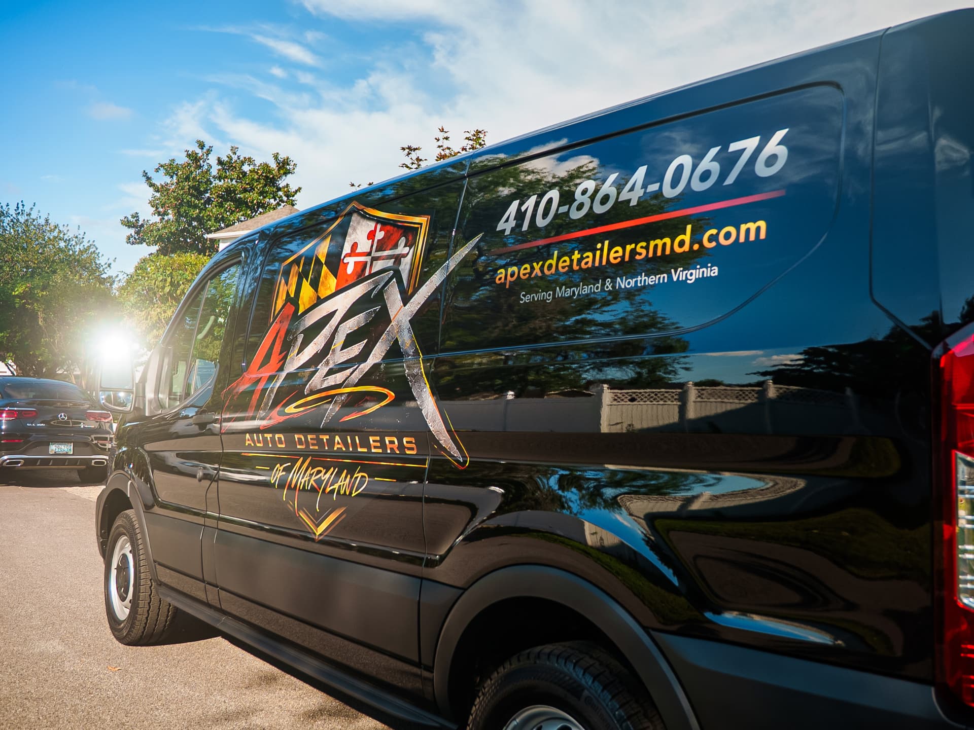 Apex Auto Detailers mobile detailing van parked in a Maryland driveway